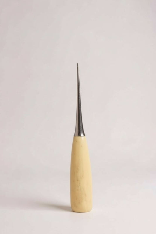 Konik biz ile mevcut deri deliğini genişletme