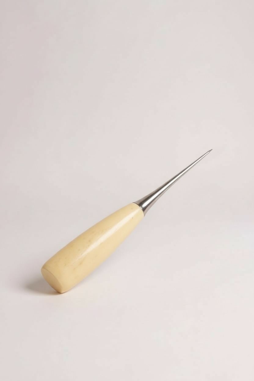 Konik biz ile deri üzerinde kontrollü delik açma